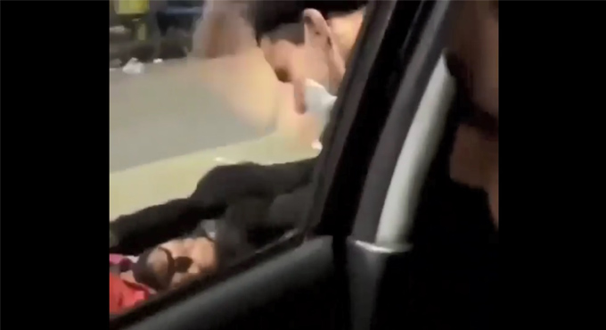 youth slapped man sleeping on pavement video 