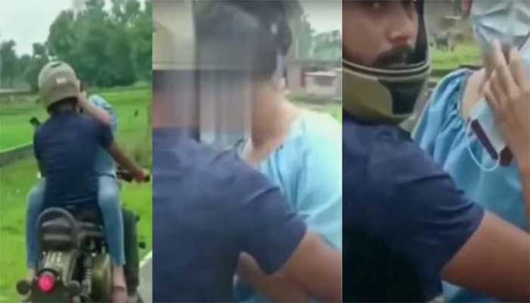 couple ride on bike viral video 