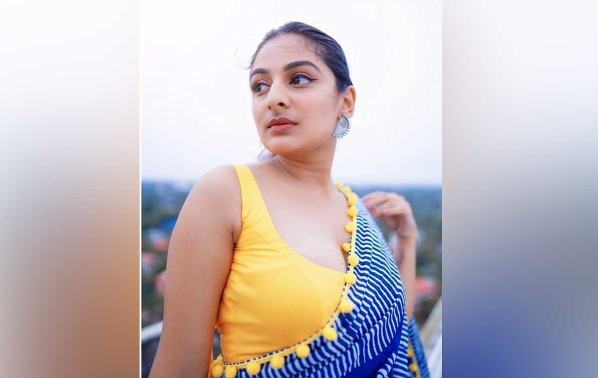 Esther Anil latest blue and yellow color saree photos viral 