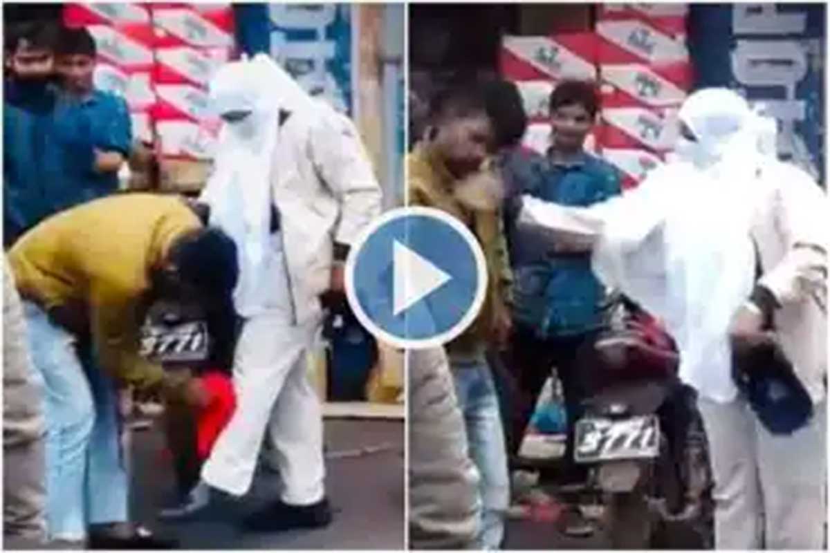 Viral News woman cop slaps man for spraying mud on her 